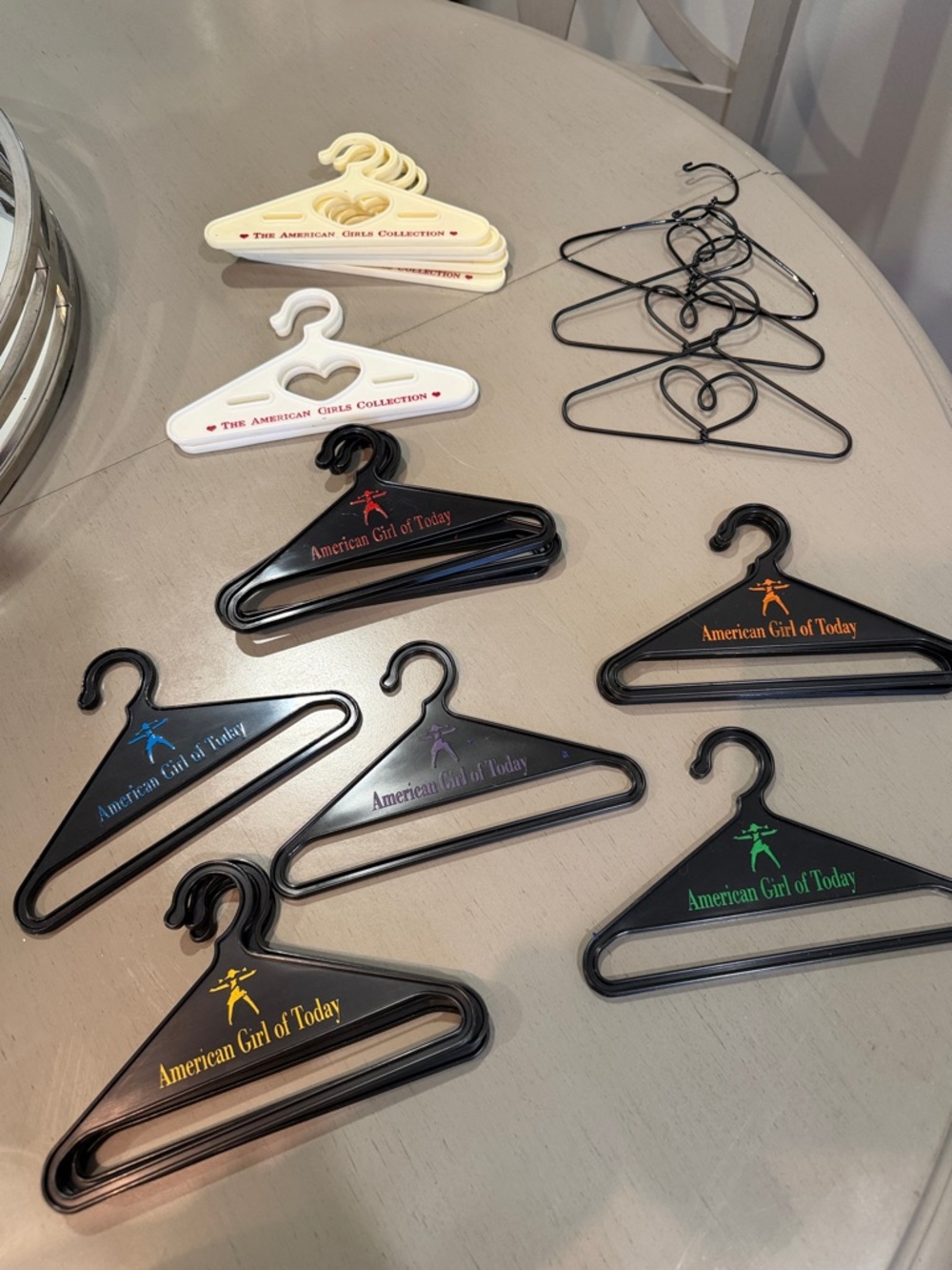 American Girl Plastic Doll Hangers in Cream and White with Red Logo